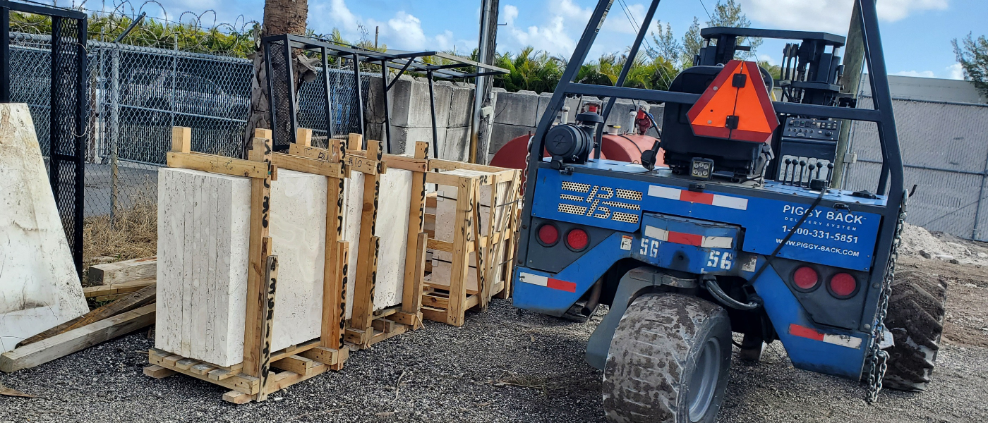 TRUCKING ALL TERRAIN PIGGY BACK FORKLIFT