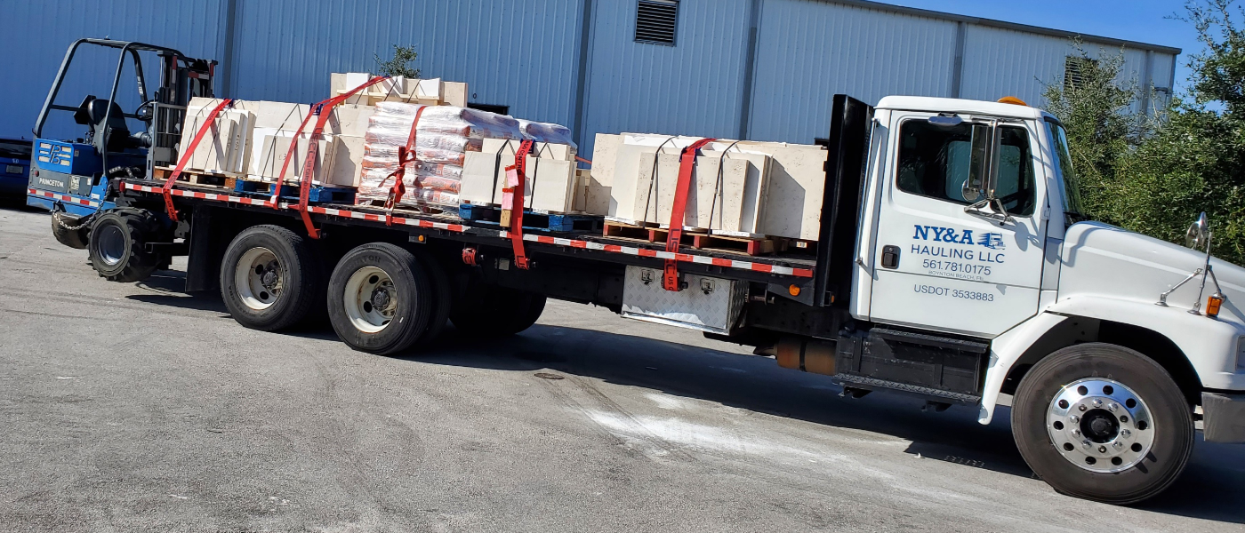 NY&A trucking piggy back delivery stone